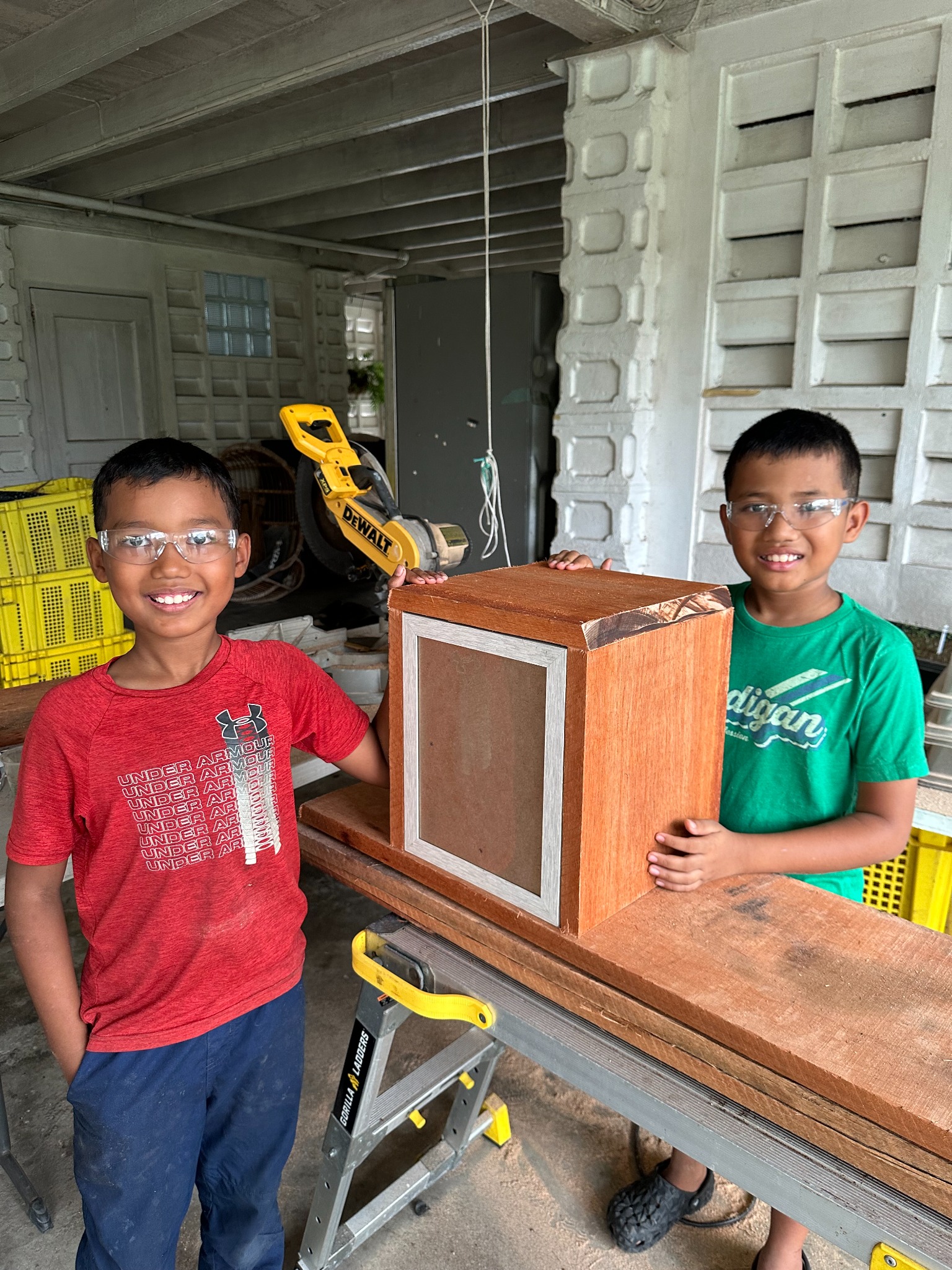 The wooden library cabinet assembled on the workbench